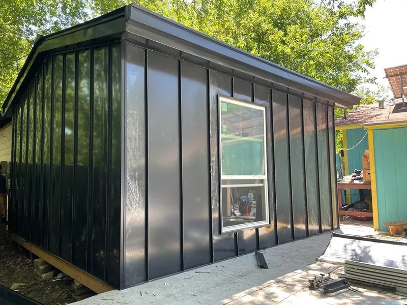 Black standing seam metal wall panels for Metal Roof Installation in Cheyenne