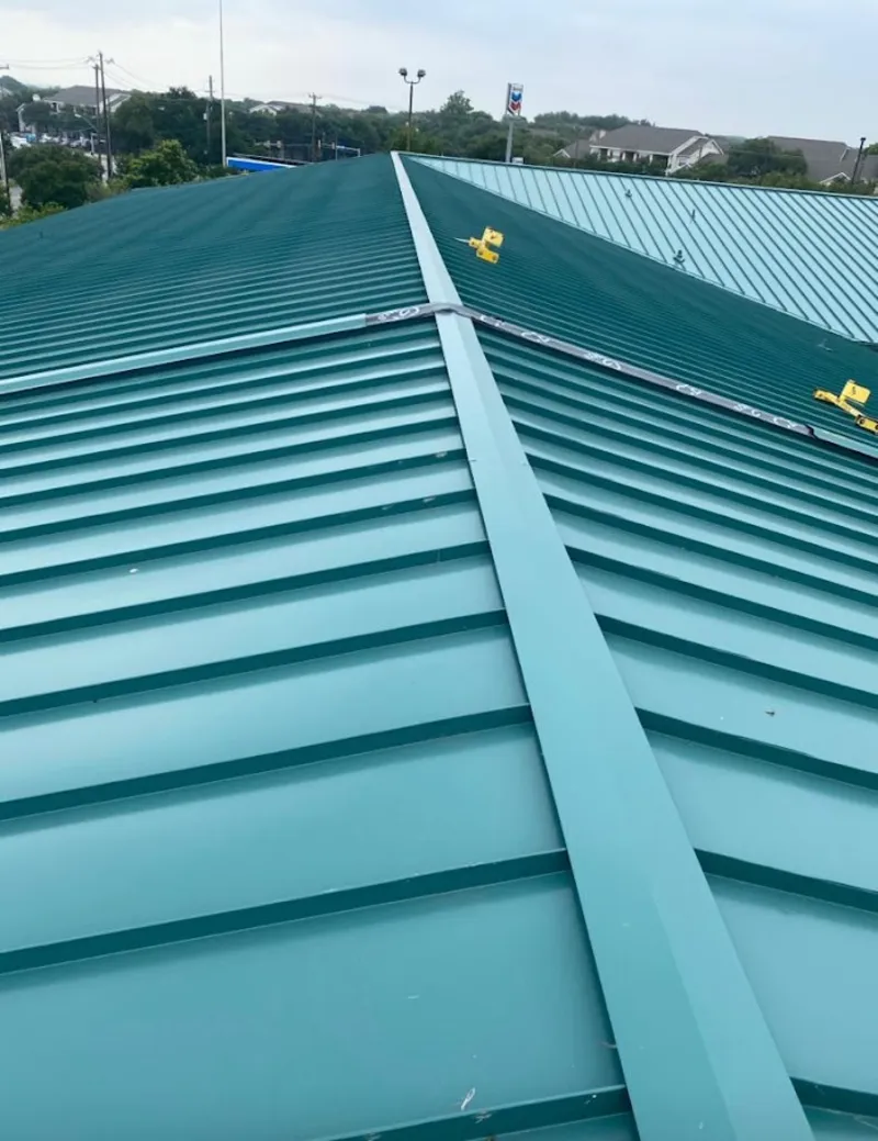 Green commercial metal roof ridge and valley for Metal Roof Repair in Cheyenne